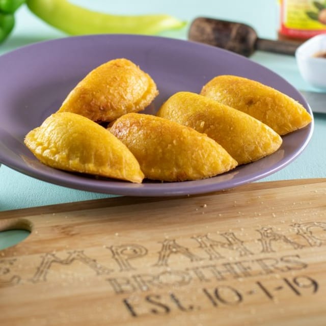 Jamaican Jerk Pork w/ Potato Empanada.
